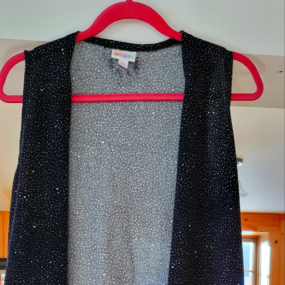 Cover length vest by Lula Roe size small. dark navy/black with small white dots